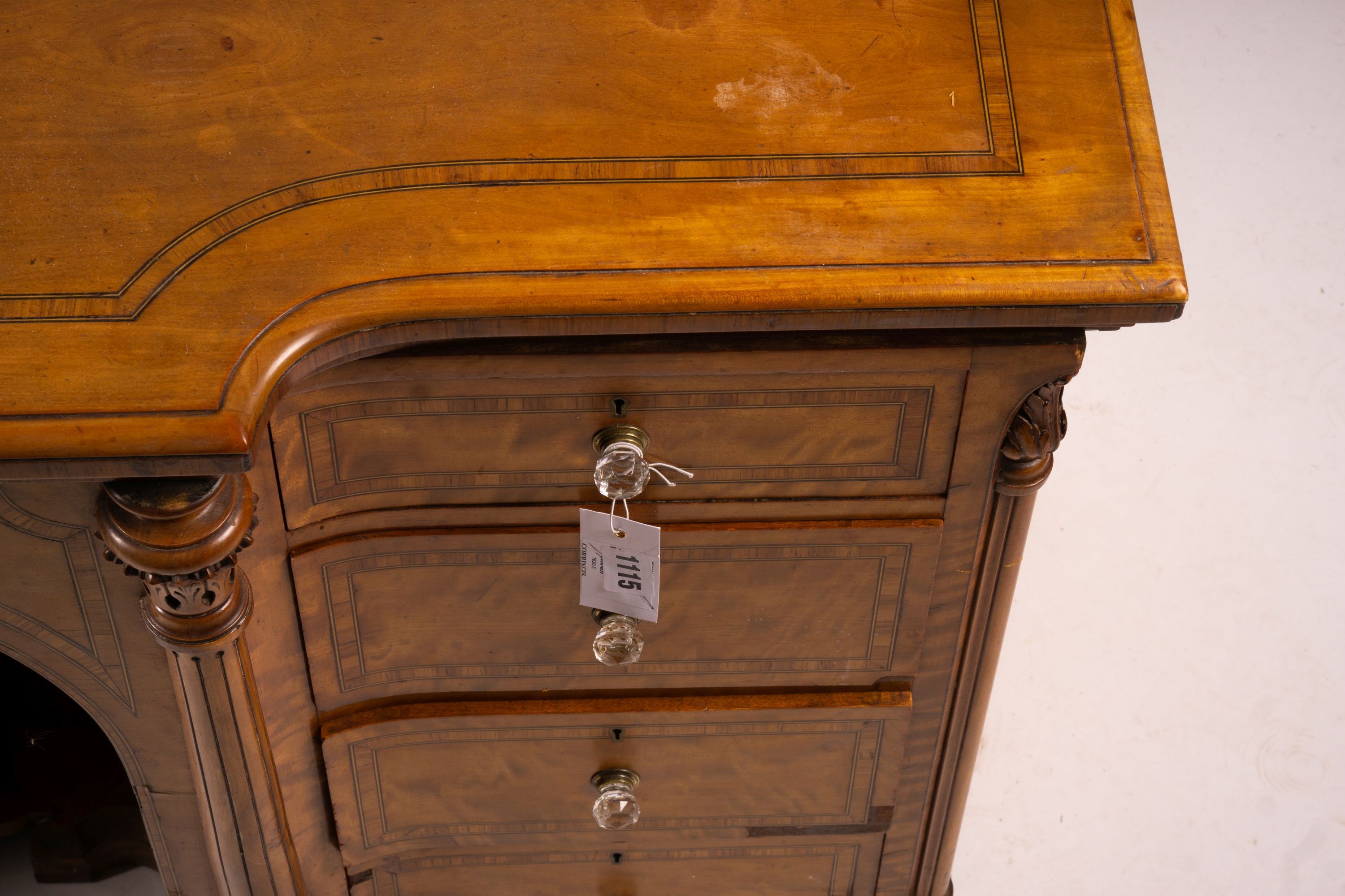 A late Victorian banded satinwood kneehole desk, width 138cm, depth 67cm, height 71cm